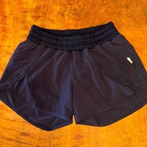 Perfect condition black Lululemon running shorts. Size 4